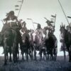 Atsina Warriors Lithographic Print by American photographer Edward S. Curtis