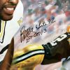 Leading By Example, personally signed by The Minister of Defense, Reggie White of the Green Bay Packers. The distinctive "1st Cor. 13" is inscribed below his signature. Double signed by the artist, Andrew Goralski.