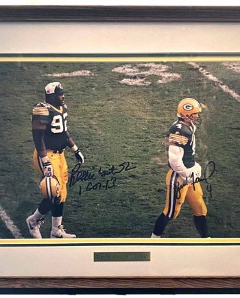 The Minister and the Kid by Ball Four. Personally signed by both, Brett Favre and Reggie White, these teammates played major roles in the Green Bay Packer's success in the 1990's.