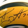 Santana Dotson is a former NFL defensive tackle. He played in two Super Bowls with the Green Bay Packers, one of which brought him a NFL Championship ring. Dotson autographed both the picture and Green Bay Packers helmet, both of which are a wonderful addition to any sports collection. Available now from Art Agents International where creative collectibles are bought, sold, resold, brokered, and listed in a secure and private manner globally